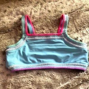 This is a blue and pink swimsuit top super comfortable, Super soft,Very flexible